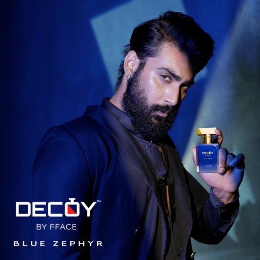 Decoy Blue Zephyr 50ml travel size perfume model shot man holding luxury unisex fragrance bottle
