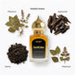 Decoy Oud Al Zahra alcohol-free attar with ingredients on a white background