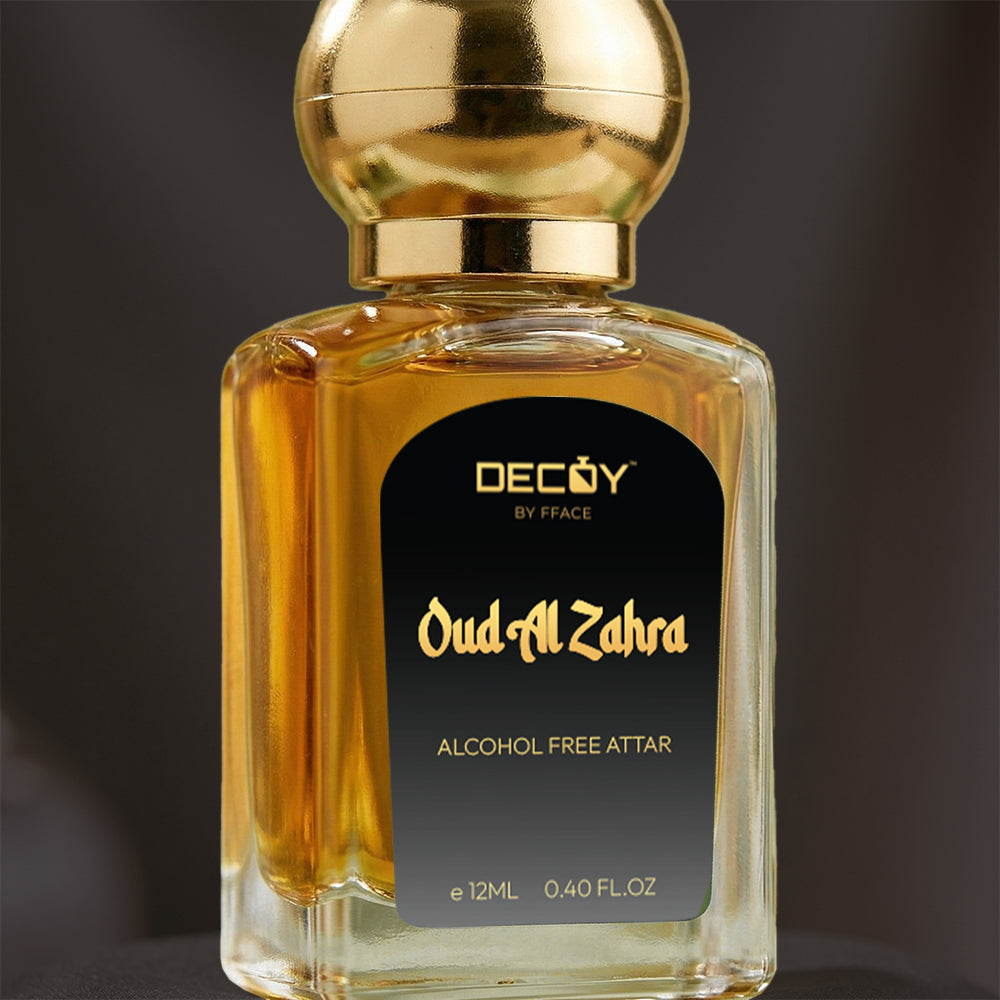 Perfume bottle labeled 'Oud Al Zahra' by Decoy on a dark background