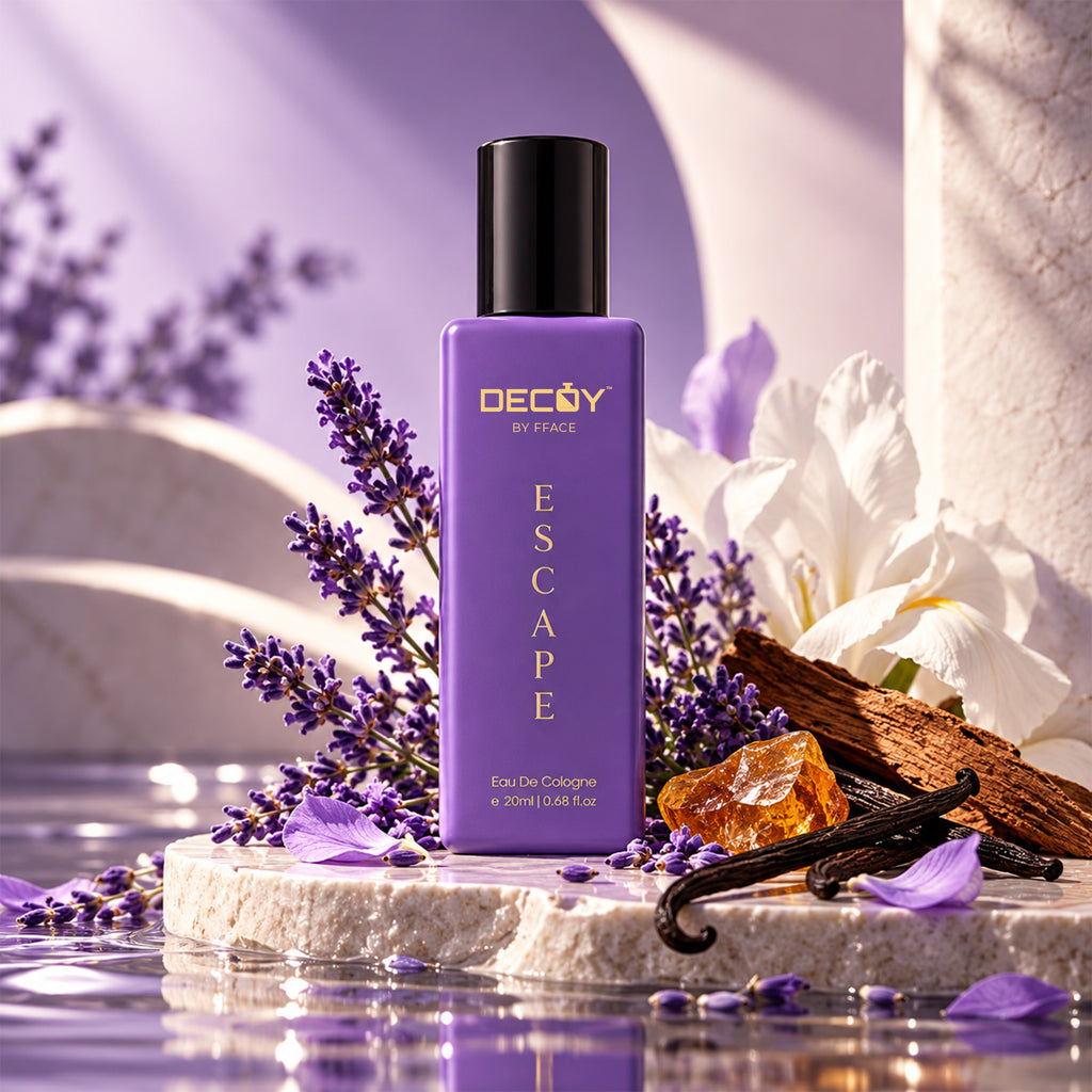 Decoy Escape purple bottle styled with lavender, wood and vanilla pods