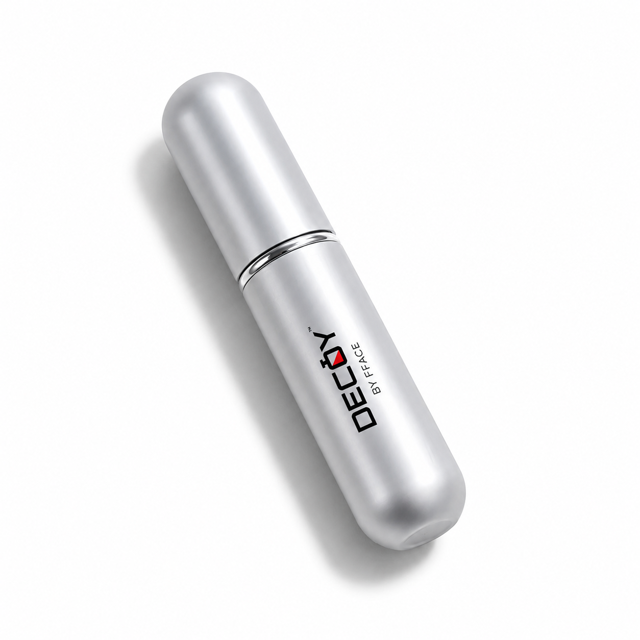 Silver cosmetic bottle with 'Decoy by Trace' branding on a white background