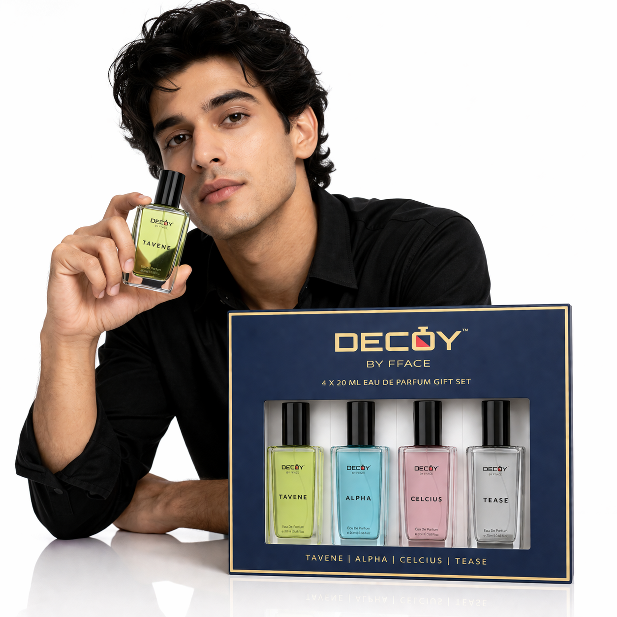 Man holding a Decoy by Fface perfume bottle with a gift set in the foreground