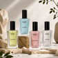 Four Decoy perfume bottles on a neutral background with decorative elements.