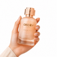 Hand holding a perfume bottle labeled 'Decoy by Face' with a peachy color on a white background
