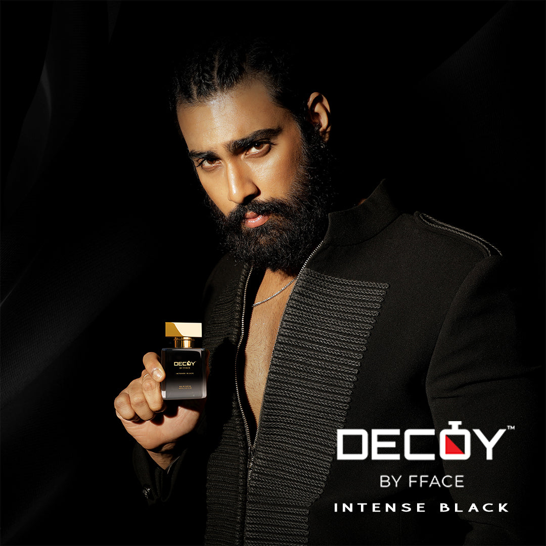 Decoy Intense Black 50ml travel size perfume model shot man in suit holding luxury fragrance