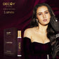 Decoy Lumea 25ml travel size perfume model shot woman in purple dress holding luxury fragrance