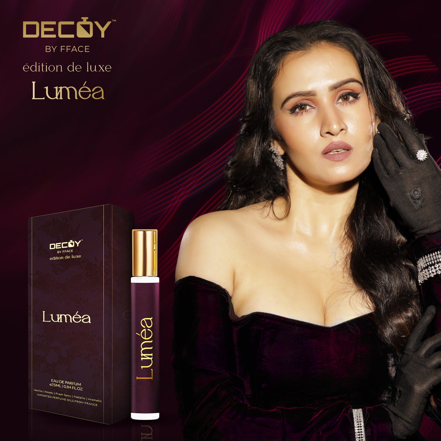 Decoy Lumea 25ml travel size perfume model shot woman in purple dress holding luxury fragrance