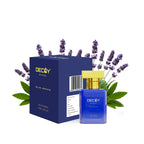 Decoy Blue Zephyr perfume bottle and packaging with lavender flowers on a white background