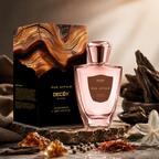 Decoy Oud Affair perfume bottle and packaging on a rustic background