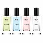 Four Decoy perfume bottles with different colored liquids and labels on a white background.