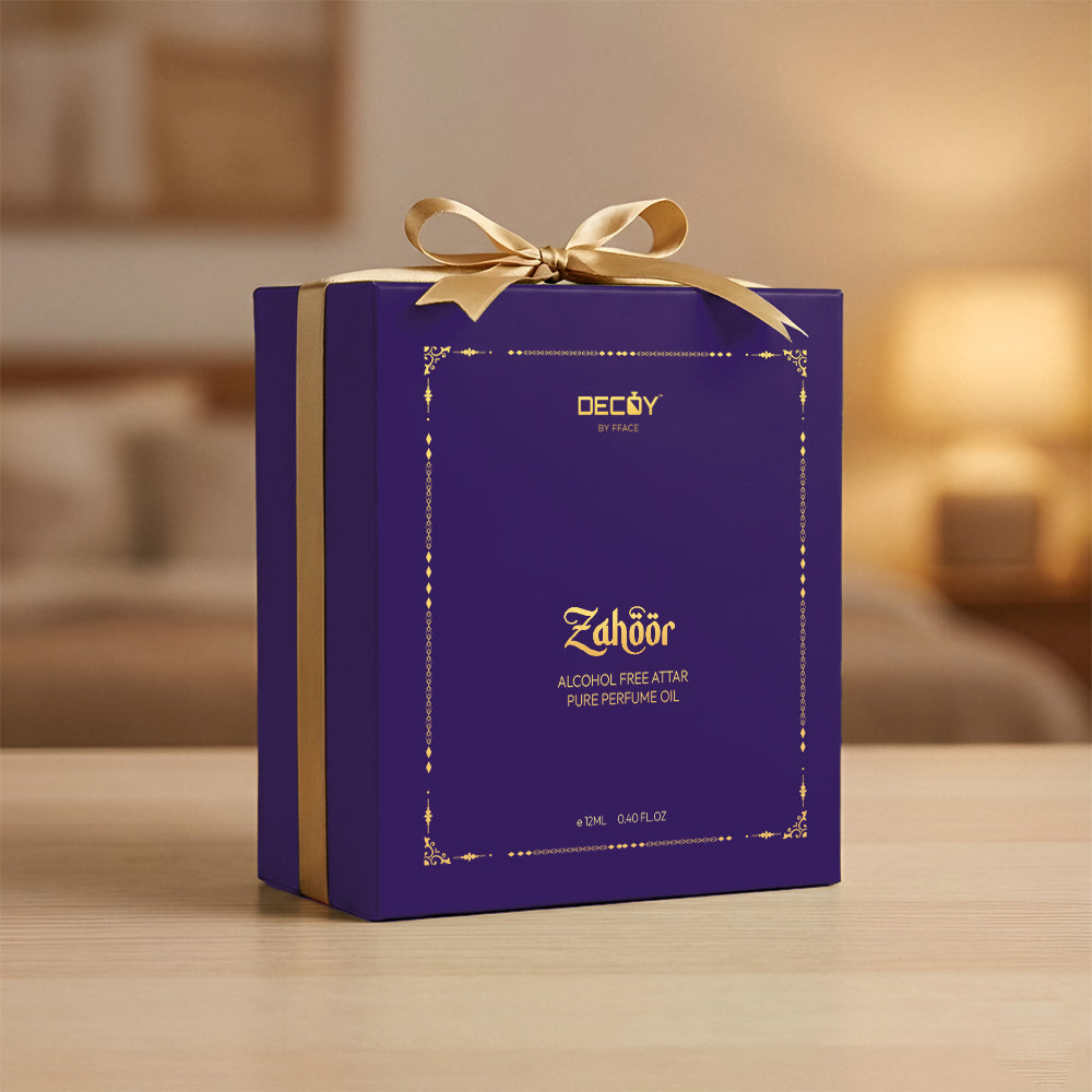 Purple box with gold ribbon and 'Zahoor' branding on a blurred background