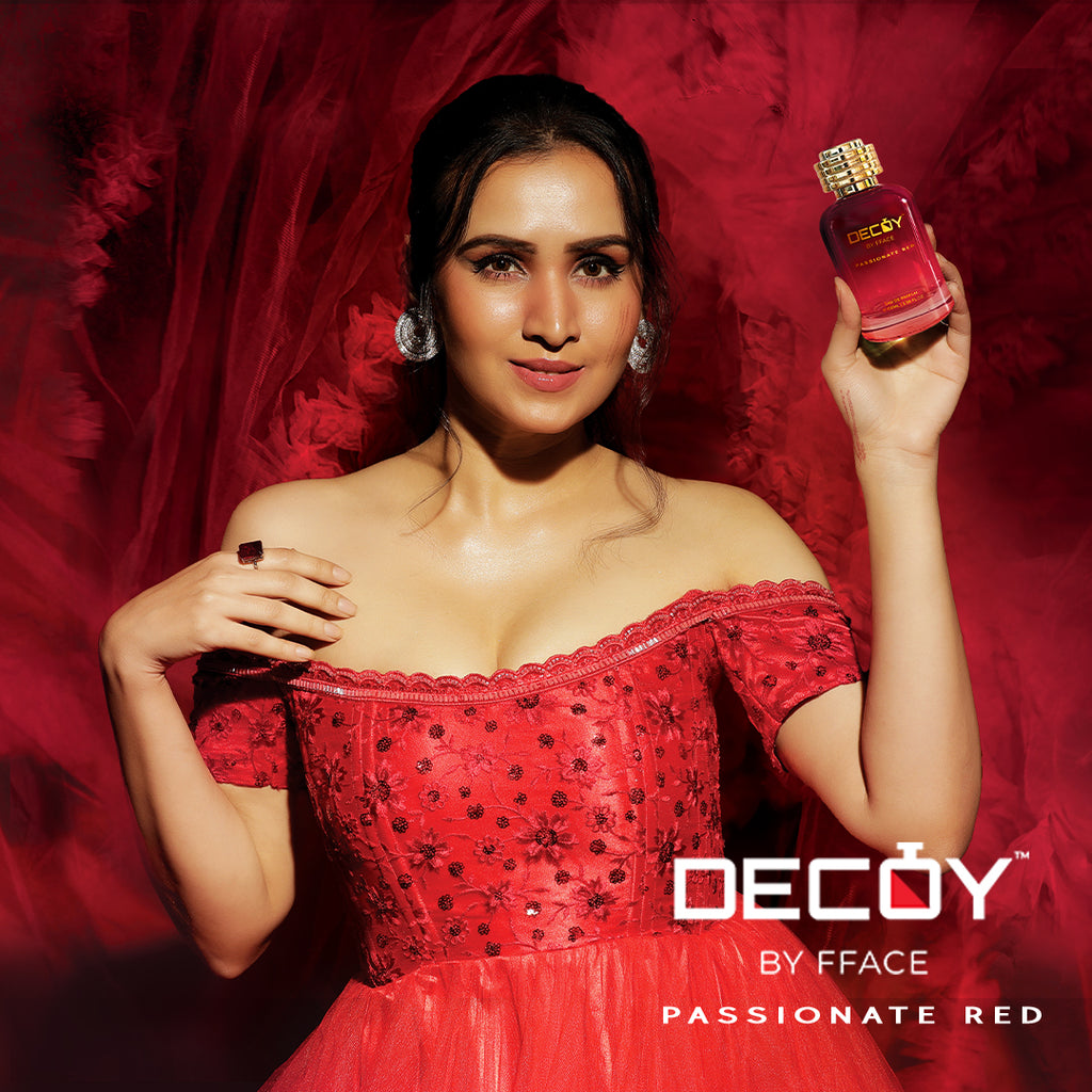 Decoy Passionate Red 100ml perfume model shot woman in red dress holding luxury fragrance