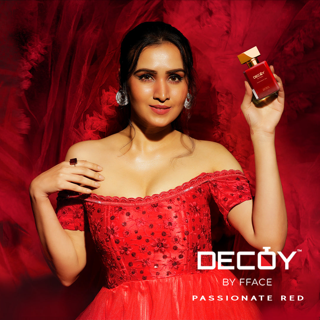 Decoy Passionate Red 50ml travel size perfume model shot woman in red dress holding luxury fragrance