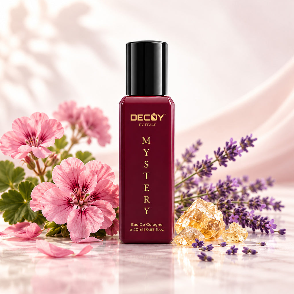 Decoy Mystery 20ml bottle beside geranium, lavender and resin representing its heart notes
